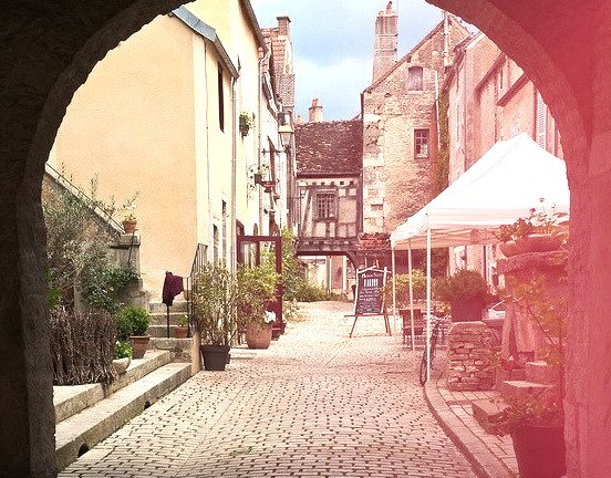 A small mdieval street in Noyers-sur-Serein, Burgundy, France